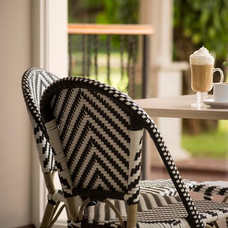 Radisson Hotel Panama Canal Exterior photo A typical bistro chair